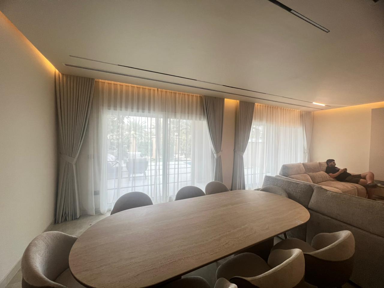 Motorized luxury curtains for UAE home installation with smart automation integration
